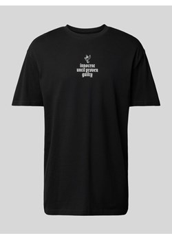 T-shirt o kroju oversized z nadrukowanym napisem ze sklepu Peek&Cloppenburg  w kategorii T-shirty męskie - zdjęcie 171173939