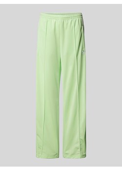 Spodnie treningowe o kroju regular fit z wyhaftowanym logo model ‘FIREBIRD’ ze sklepu Peek&Cloppenburg  w kategorii Spodnie damskie - zdjęcie 171173949