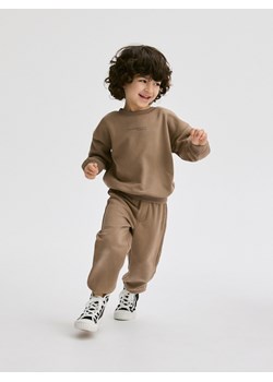 Reserved - Bawełniane joggery - brązowy ze sklepu Reserved w kategorii Spodnie i półśpiochy - zdjęcie 171185066