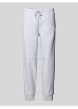 Spodnie dresowe z wpuszczanymi kieszeniami model ‘AMERICAN’ ze sklepu Peek&Cloppenburg  w kategorii Spodnie męskie - zdjęcie 171206609
