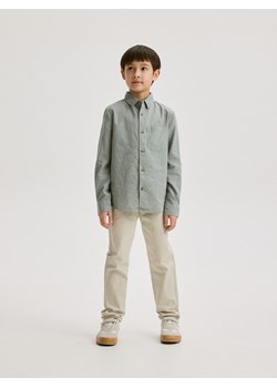 Reserved - Spodnie chino regular fit - beżowy ze sklepu Reserved w kategorii Spodnie chłopięce - zdjęcie 171219516