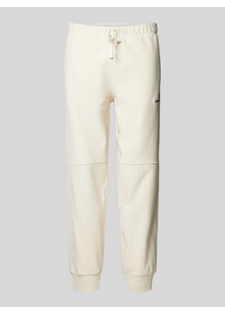 Spodnie dresowe z wpuszczanymi kieszeniami model ‘AMERICAN’ ze sklepu Peek&Cloppenburg  w kategorii Spodnie męskie - zdjęcie 171223597