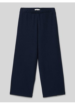 Spodnie materiałowe z fakturowanym wzorem ze sklepu Peek&Cloppenburg  w kategorii Spodnie dziewczęce - zdjęcie 171223677