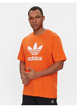 adidas T-Shirt adicolor Trefoil IR8000 Pomarańczowy Regular Fit ze sklepu MODIVO w kategorii T-shirty męskie - zdjęcie 171251465