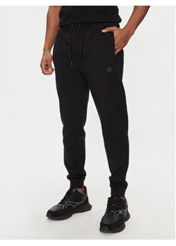 Hugo Spodnie dresowe Dimacs 50509457 Czarny Relaxed Fit ze sklepu MODIVO w kategorii Spodnie męskie - zdjęcie 171252097