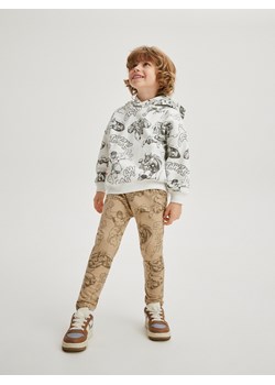 Reserved - Bawełniane spodnie Marvel - beżowy ze sklepu Reserved w kategorii Spodnie chłopięce - zdjęcie 171257597