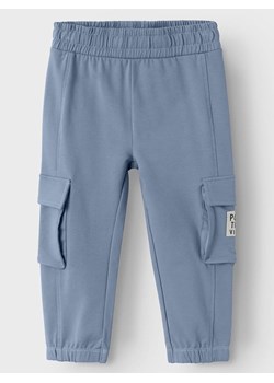 name it Spodnie dresowe &quot;Dylan&quot; w kolorze błękitnym ze sklepu Limango Polska w kategorii Spodnie chłopięce - zdjęcie 171295657