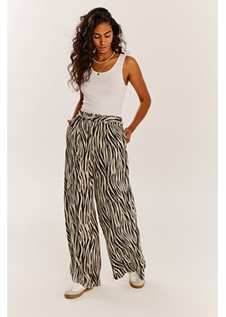 Szerokie spodnie Wild One XS/S ze sklepu NAOKO w kategorii Spodnie damskie - zdjęcie 171304276
