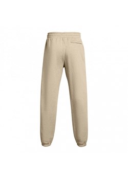 Męskie spodnie dresowe Under Armour UA Essential Flc Puddle Pant - beżowe ze sklepu Sportstylestory.com w kategorii Spodnie męskie - zdjęcie 171309767