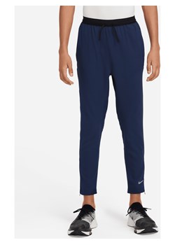 Spodnie treningowe dla dużych dzieci (chłopców) Dri-FIT Nike Multi Tech EasyOn - Niebieski ze sklepu Nike poland w kategorii Spodnie męskie - zdjęcie 171331565