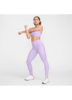 Damskie legginsy o pełnej długości ze średnim stanem i kieszeniami zapewniające mocne wsparcie Nike Go - Fiolet ze sklepu Nike poland w kategorii Spodnie damskie - zdjęcie 171331575