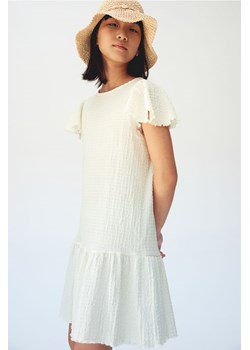 H & M - Dżersejowa sukienka z falbankowym rękawem - Biały ze sklepu H&M w kategorii Sukienki dziewczęce - zdjęcie 171337017