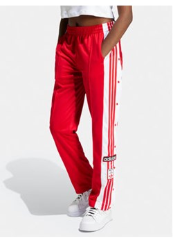 adidas Spodnie dresowe Adibreak IP0620 Czerwony Regular Fit ze sklepu MODIVO w kategorii Spodnie damskie - zdjęcie 171343647