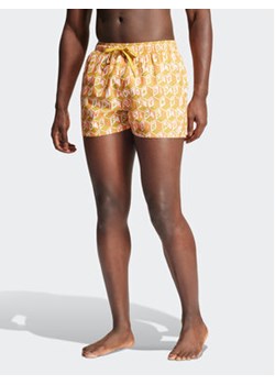 adidas Szorty kąpielowe FARM Rio 3-Stripes CLX IR6199 Żółty Regular Fit ze sklepu MODIVO w kategorii Kąpielówki - zdjęcie 171343865