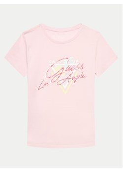 Guess T-Shirt J4GI23 K6YW4 Różowy Regular Fit ze sklepu MODIVO w kategorii Bluzki dziewczęce - zdjęcie 171343939