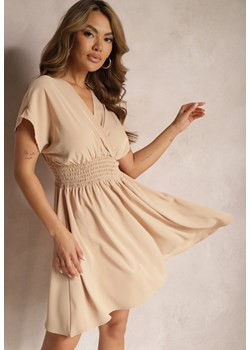 Beżowa Rozkloszowana Sukienka o Kopertowym Fasonie Assineda ze sklepu Renee odzież w kategorii Sukienki - zdjęcie 171357765