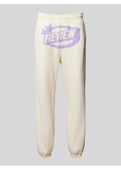 Spodnie dresowe o kroju regular fit z nadrukiem z logo ze sklepu Peek&Cloppenburg  w kategorii Spodnie męskie - zdjęcie 171364455