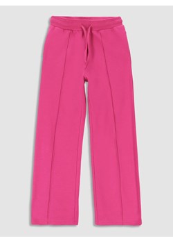 MOKIDA Spodnie dresowe w kolorze różowym ze sklepu Limango Polska w kategorii Spodnie dziewczęce - zdjęcie 171365436
