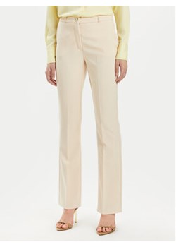 Rinascimento Spodnie materiałowe CFC0118270003 Beżowy Regular Fit ze sklepu MODIVO w kategorii Spodnie damskie - zdjęcie 171411779