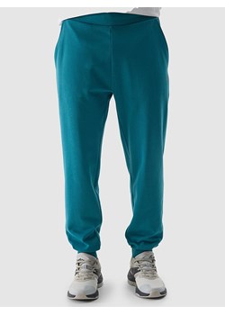4F Spodnie dresowe w kolorze turkusowym ze sklepu Limango Polska w kategorii Spodnie męskie - zdjęcie 171432719