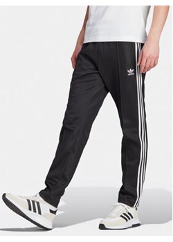 adidas Spodnie dresowe adicolor Classics Beckenbauer II5764 Czarny Slim Fit ze sklepu MODIVO w kategorii Spodnie męskie - zdjęcie 171442309