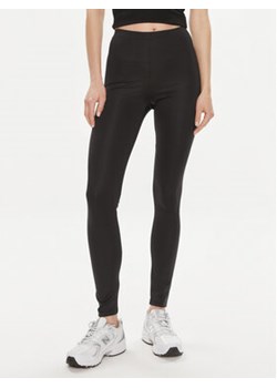 Gina Tricot Legginsy 21522 Czarny Slim Fit ze sklepu MODIVO w kategorii Spodnie damskie - zdjęcie 171454478