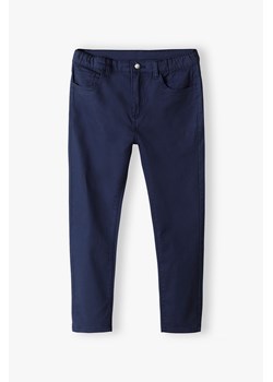 Eleganckie spodnie granatowe dla chłopca slim ze sklepu 5.10.15 w kategorii Spodnie chłopięce - zdjęcie 171455418