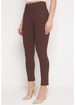 Ciemnobrązowe Spodnie Skinny z Gumką w Pasie i Kieszeniami Nellina ze sklepu Born2be Odzież w kategorii Spodnie damskie - zdjęcie 171462805