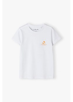 Biały t-shirt dla dziewczynki z małym nadrukiem - delfinki ze sklepu 5.10.15 w kategorii Bluzki dziewczęce - zdjęcie 171463226