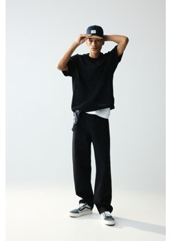 H & M - T-shirt z ażurowej dzianiny Loose Fit - Czarny ze sklepu H&M w kategorii Bluzki damskie - zdjęcie 171560615