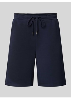 Spodnie dresowe o kroju regular fit z tunelem model ‘Banu’ ze sklepu Peek&Cloppenburg  w kategorii Szorty - zdjęcie 171589477