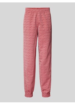 Spodnie dresowe z wzorem na całej powierzchni ze sklepu Peek&Cloppenburg  w kategorii Spodnie męskie - zdjęcie 171702666