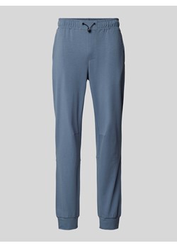 Spodnie dresowe z kieszeniami z tyłu model ‘JOSHUA’ ze sklepu Peek&Cloppenburg  w kategorii Spodnie męskie - zdjęcie 171703319