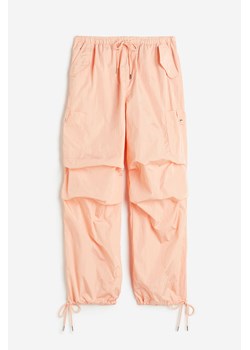 H & M - Nylonowe spodnie spadochronowe - Pomarańczowy ze sklepu H&M w kategorii Spodnie damskie - zdjęcie 171703707