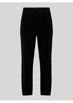 Spodnie dresowe z prążkowaną fakturą ze sklepu Peek&Cloppenburg  w kategorii Spodnie męskie - zdjęcie 171934598