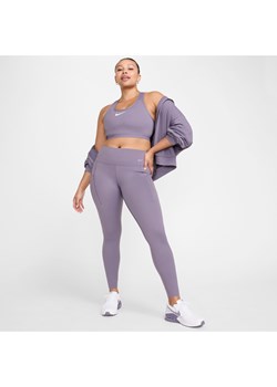 Damskie legginsy o pełnej długości ze średnim stanem i kieszeniami zapewniające mocne wsparcie Nike Go - Fiolet ze sklepu Nike poland w kategorii Spodnie damskie - zdjęcie 171953056