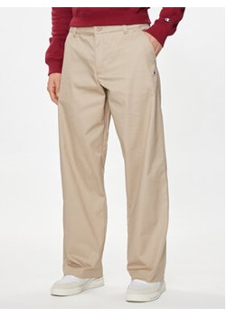 Champion Spodnie materiałowe 220013 Beżowy Wide Fit ze sklepu MODIVO w kategorii Spodnie męskie - zdjęcie 171953869