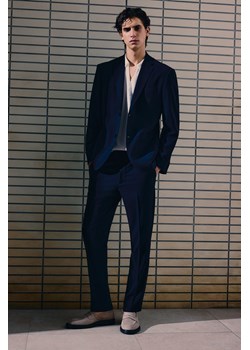 H & M - Spodnie garniturowe z kory Slim Fit - Niebieski ze sklepu H&M w kategorii Spodnie męskie - zdjęcie 171983197