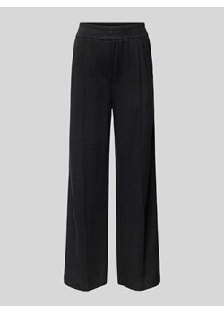 Spodnie sportowe o rozkloszowanym kroju z elastycznym pasem ze sklepu Peek&Cloppenburg  w kategorii Spodnie damskie - zdjęcie 171989426