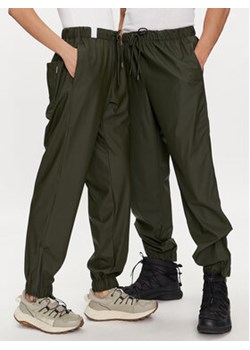 Rains Spodnie przeciwdeszczowe Rain Pants Regular W3 18560 Zielony Regular Fit ze sklepu MODIVO w kategorii Spodnie damskie - zdjęcie 171992495
