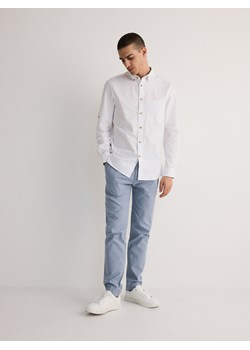 Reserved - Spodnie chino slim fit - niebieski ze sklepu Reserved w kategorii Spodnie męskie - zdjęcie 172003475