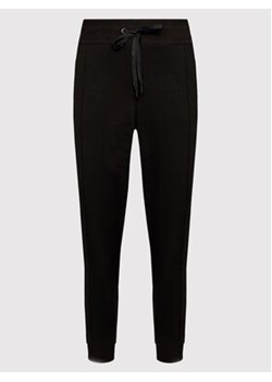 DKNY Sport Spodnie dresowe DPPP2513 Czarny Regular Fit ze sklepu MODIVO w kategorii Spodnie damskie - zdjęcie 172028968