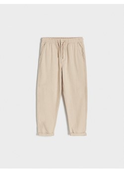 Reserved - Spodnie chino - beżowy ze sklepu Reserved w kategorii Spodnie chłopięce - zdjęcie 172035888