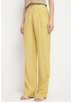Żółte Spodnie Długie Szerokie z Kieszeniami Palazzo Lisarana ze sklepu Born2be Odzież w kategorii Spodnie damskie - zdjęcie 172046168