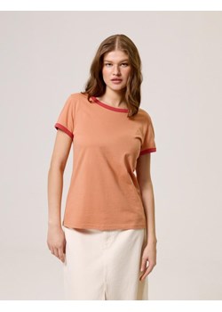 Koszulka CLTN KIT Brzoskwinia XS ze sklepu Diverse w kategorii Bluzki damskie - zdjęcie 172184506