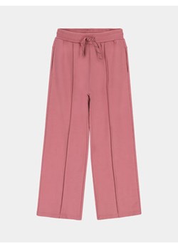 Coccodrillo Spodnie materiałowe ZC3120102MGJ Różowy Regular Fit ze sklepu MODIVO w kategorii Spodnie dziewczęce - zdjęcie 172187769