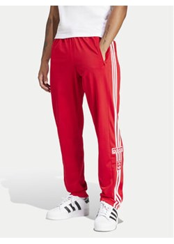 adidas Spodnie dresowe adicolor Classics Adibreak IM8221 Czerwony Regular Fit ze sklepu MODIVO w kategorii Spodnie męskie - zdjęcie 172187788