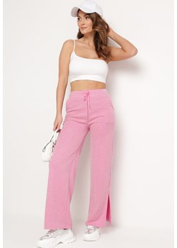 Różowe Szerokie Spodnie z Gumką w Pasie i Rozcięciami Jacilla ze sklepu Born2be Odzież w kategorii Spodnie damskie - zdjęcie 172198955