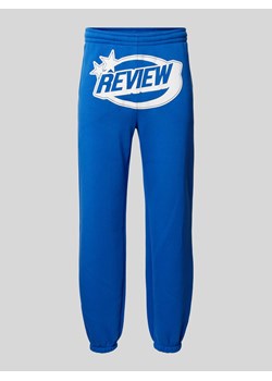 Spodnie dresowe o kroju regular fit z nadrukiem z logo ze sklepu Peek&Cloppenburg  w kategorii Spodnie męskie - zdjęcie 172238905