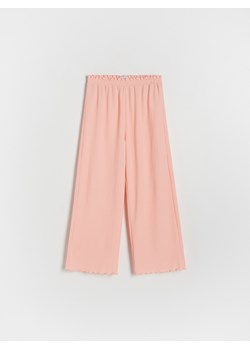 Reserved - Spodnie z szerokimi nagawkami - pomarańczowy ze sklepu Reserved w kategorii Spodnie dziewczęce - zdjęcie 172270236